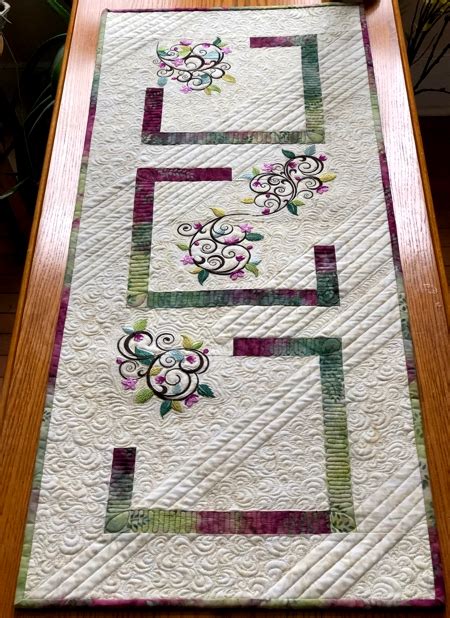 Quilted Table Runner with floral machine embroidery - Advanced Embroidery Designs | Machine ...