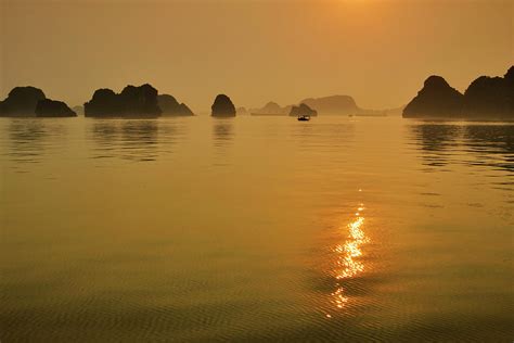 Halong Bay Sunrise Photograph by Rob Hemphill - Fine Art America