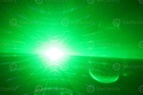 green beam laser beam on dark background 20465712 Stock Photo at Vecteezy