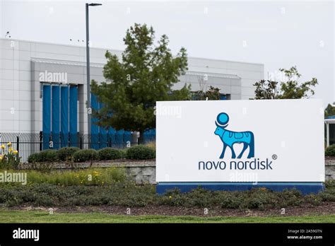 A logo sign outside of a facility occupied by Novo Nordisk in Clayton ...