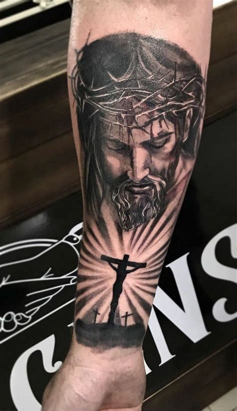 Jesus On Cross Forearm Tattoo