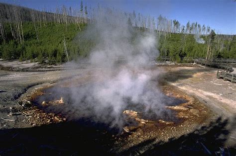 Steam emanating geyser before eruption – Geology Pics