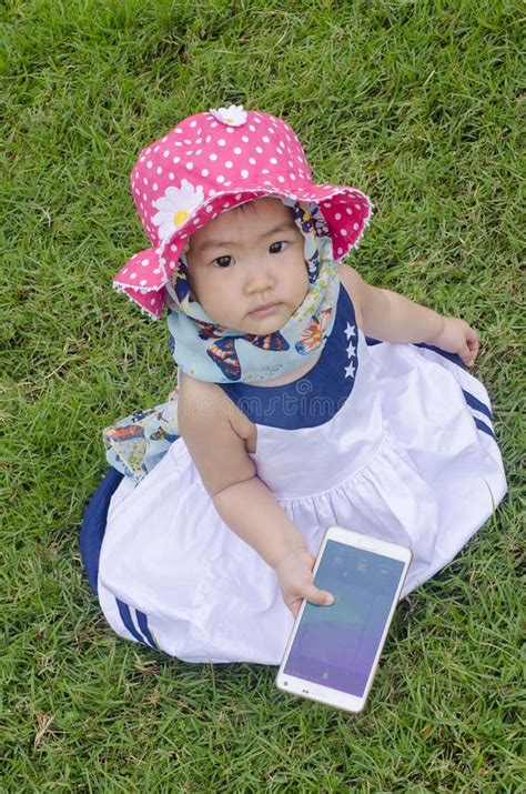 Sweet Baby Girl Playing Mobile Phone Stock Photo - Image of soft, joyful: 56048240