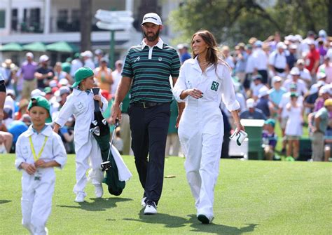 Paulina Gretzky caddies for Dustin Johnson before 2023 Masters