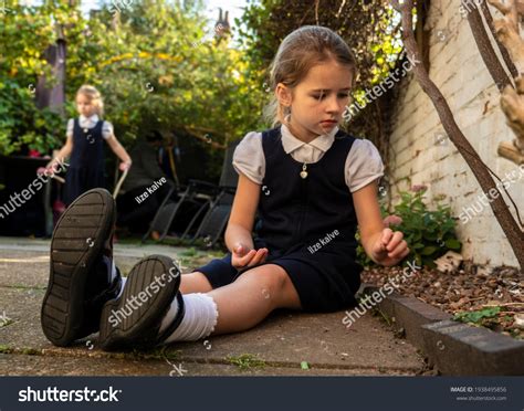 Little Girl Wearing School Uniform Sitting Stock Photo 1938495856 | Shutterstock