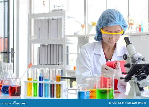 Woman Scientist Doing Experiment. Stock Photo - Image of medical ...