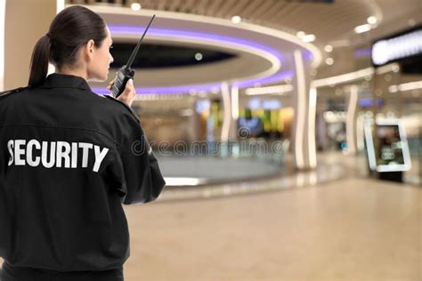 Security Guard Using Portable Radio Transmitter Shopping Mall Stock ...