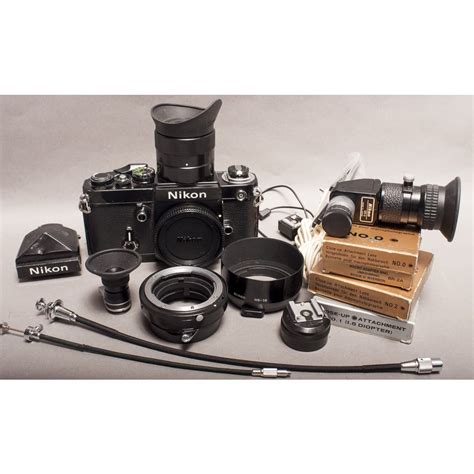 Nikon F2 body, with a DW-2 6X finder, and other Nikon accessories