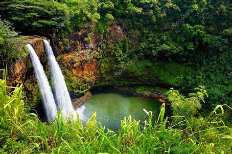 Twin Wailua waterfalls on Kauai — Stock Photo © MNStudio #60259175