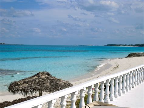 an ocean view from the balcony of a beachfront hotel in mexico, with ...