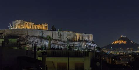 While visiting Athens, I took a picture of the Acropolis at night. Also ...