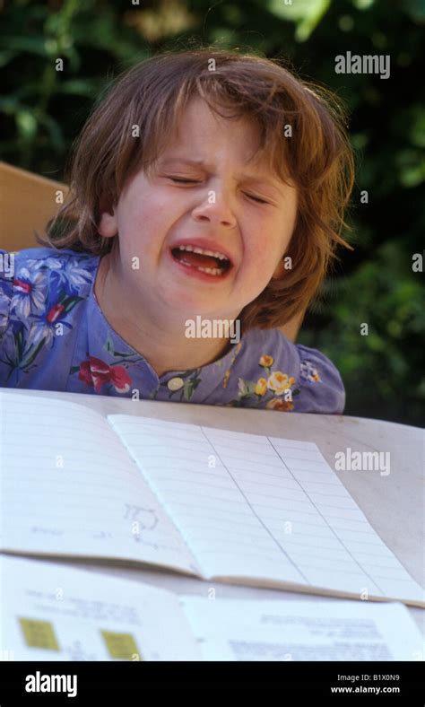 little girl doing her homework and having a tantrum Stock Photo - Alamy