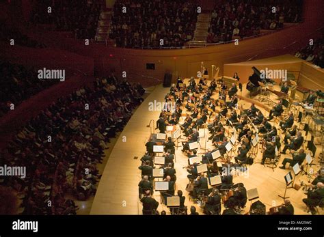 The Los Angeles Philharmonic orchestra performing at the new Disney Concert Hall designed by ...