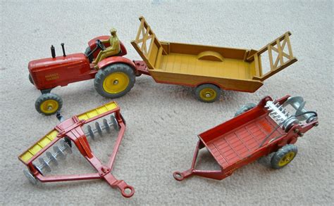 VINTAGE ORIGINAL DINKY TOYS MASSEY HARRIS FARM TRACTOR & 3 IMPLEMENTS VGC | Farm toys, Toys ...