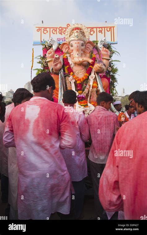 People at religious procession during Ganpati visarjan ceremony, Mumbai ...