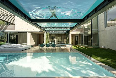 Rooftop Swimming Pool Experience in a Luxurious Modern House - InteriorZine