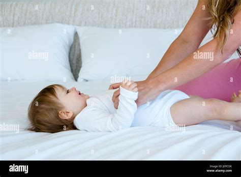 smiling baby being tickled Stock Photo - Alamy