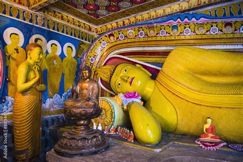 Golden reclining Buddha at Temple of the Tooth (Temple of the Sacred Tooth Relic) in Kandy ...