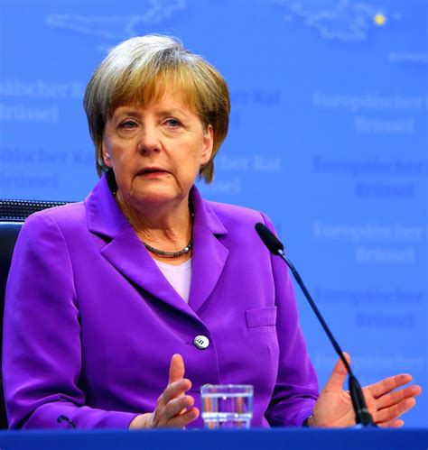 Angela Merkel holds a press conference after a European Union (EU) summit meeting