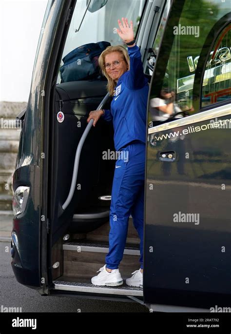 England manager Sarina Wiegman waves as the England team depart from ...