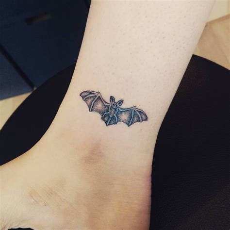 Small hand-poked bat tattoo - Tattoogrid.net