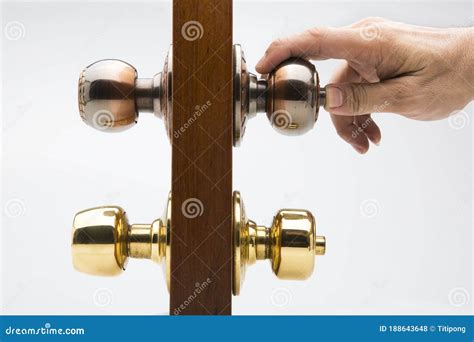 Locking Up or Unlocking Door with Key in Hand Stock Photo - Image of keyhole, home: 188643648