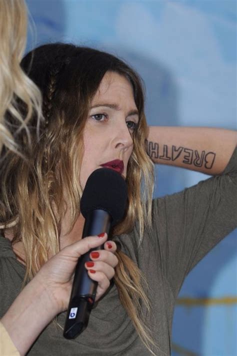 Drew Barrymore’s 9 Tattoos & Their meanings – Body Art Guru