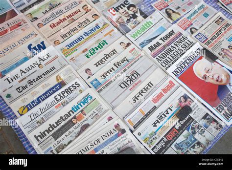 Selection of newspapers on sale on the street in Delhi, India Stock Photo - Alamy