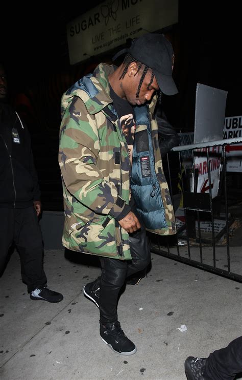 Travis Scott in the Supreme Camouflage Winter Jacket | Vogue