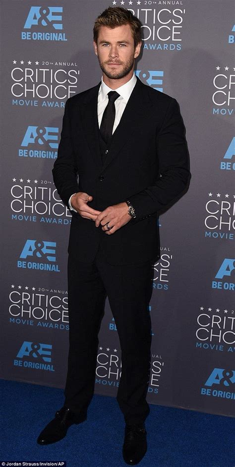 Back in black: Chris Hemsworth looked suave in a black three-piece suit as he attended the ...