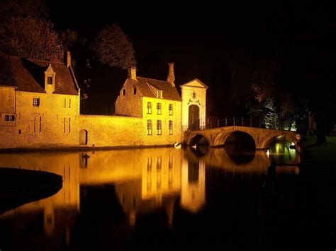 Old town mirroring on water at night, belgium, bruges free image download