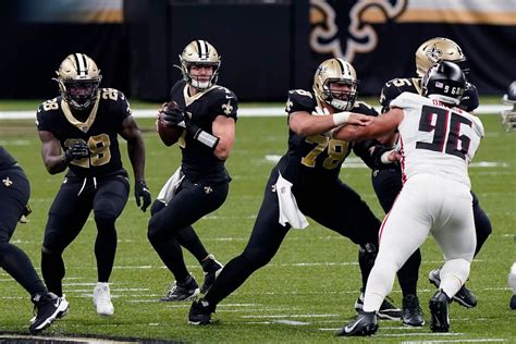 Saints win 7th straight, beat Falcons in Hill's first start