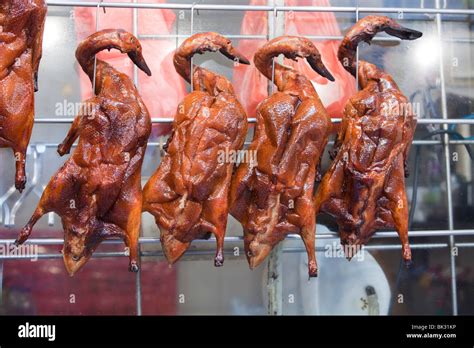 Roast ducks on a street food stall in Kowloon, Hong Kong, China Stock ...