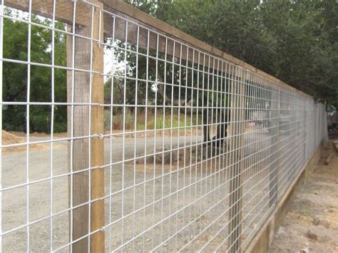 4x4 Hog Panel mesh on 4x4 posts and kickboard by Arbor Fence, Inc ...