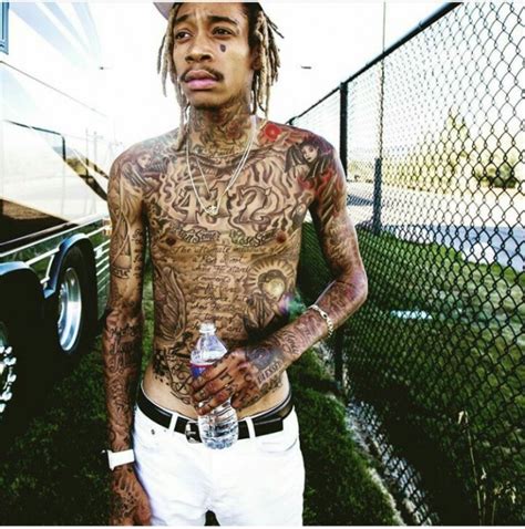 All Wiz Khalifa Tattoos Meanings - Amber Rose, Face & etc.