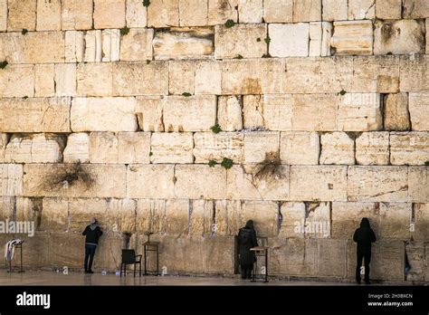 People praying in the Western Wall in the old city Jerusalem, Israel Western Wall. Prayers at ...