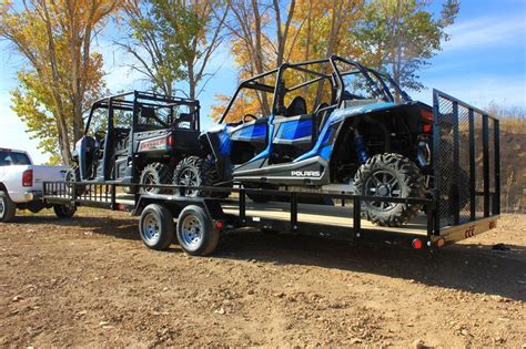 Echo 26' Advantage ATV-UTV side by side trailer with two full size machines. Shown with optional ...