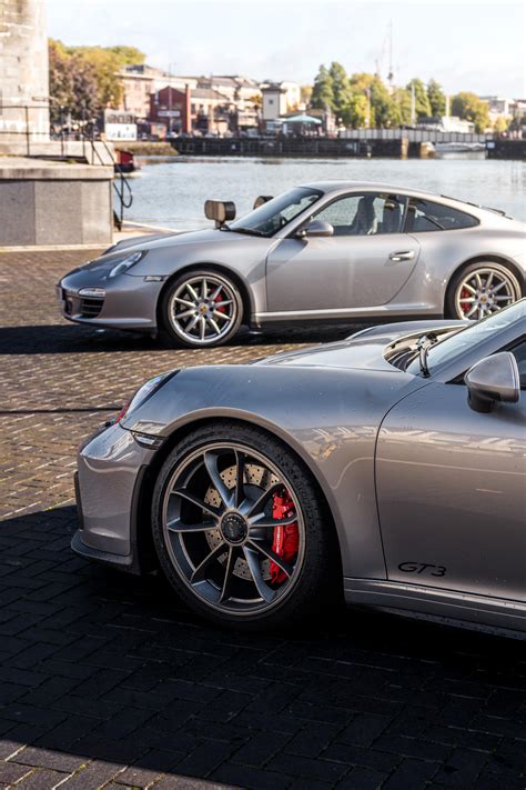 Porsche 911 GT3 and a 911 Carrera in matching specs [3584x5376] - OC : r/carporn