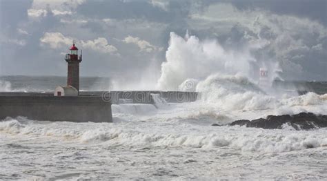 Storm Waves Over the Lighthouse Stock Photo - Image of dramatic, blue ...