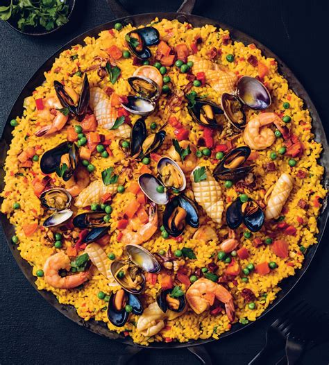 Seafood and chorizo paella - Resist the temptation to stir the paella. Let it sit to develop the ...