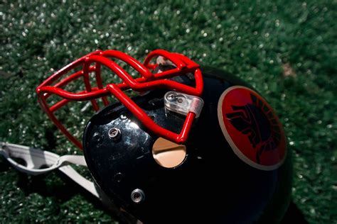 Black and Red Football Helmet · Free Stock Photo