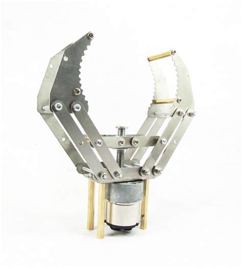 a metal object with multiple blades attached to it's back end, on a white background