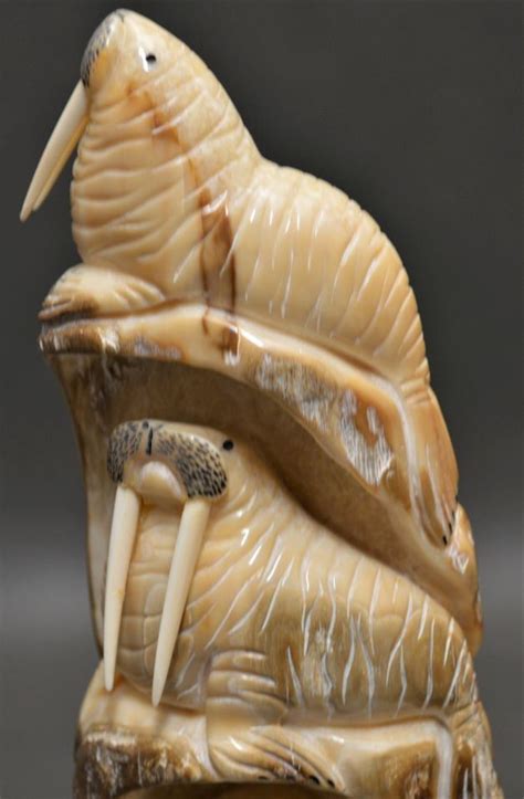 NORTHWEST COAST HAND CARVED FOSSILIZED IVORY SCULPTURE - R. G. Munn Auction LLC