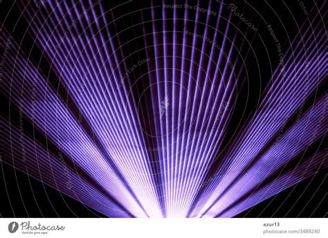 Purple laser show nightlife club stage shining sparkling rays. Luxury ...