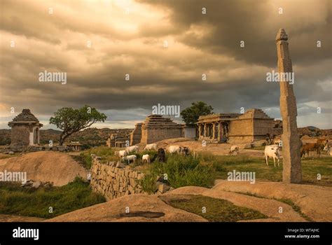 Ruins of Hampi at Hemakuta Hill Sunset Point Stock Photo - Alamy