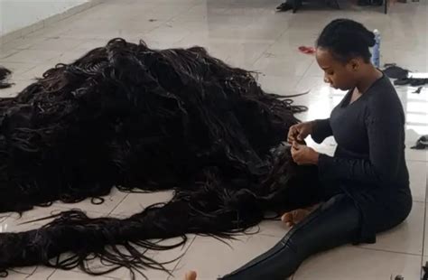 Nigerian Woman Spent 11 Days, $2,493 To Create World’s Longest Handmade Wig | Reporters At Large