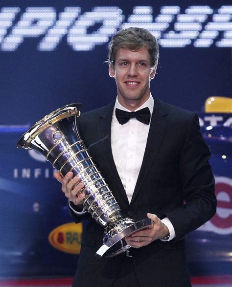 Sebastian Vettel - 2011 F1 Champion collects his trophy...