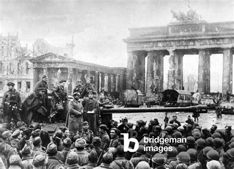 Soviet tanks and soldiers in front of the Brandenburg Gate, 1945