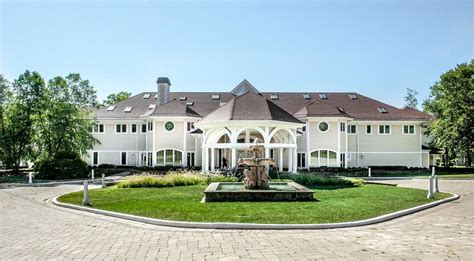 50 Cent's Connecticut mansion gets a $13M price cut ahead of 'Million Dollar Listing' stint | 6sqft