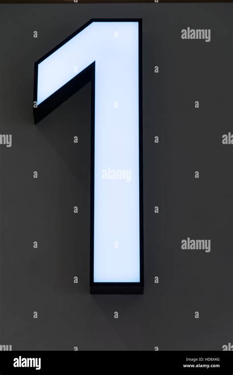 Number 1 Neon sign on the wall Stock Photo - Alamy